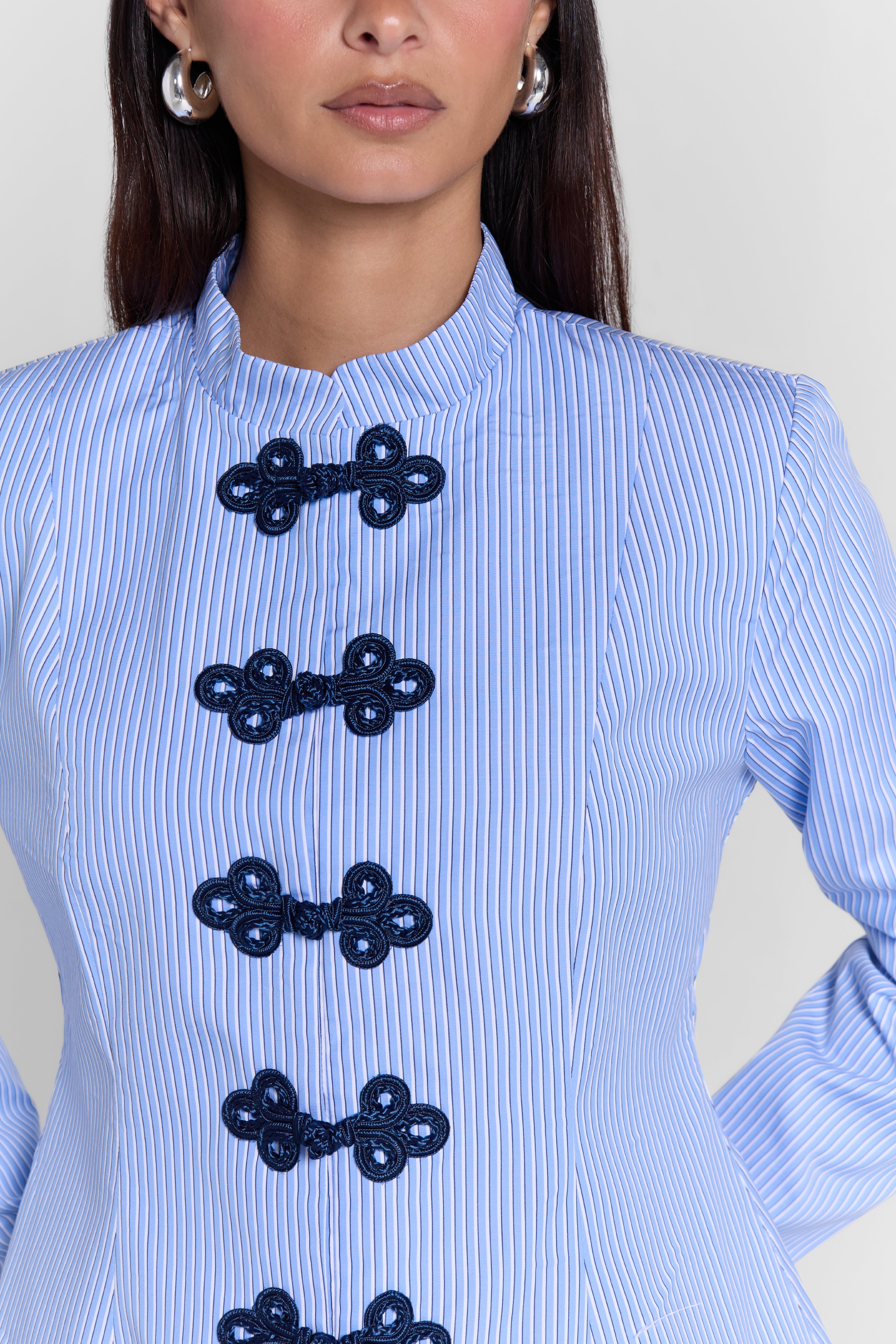 FITTED SHIRT WITH FASTENINGS