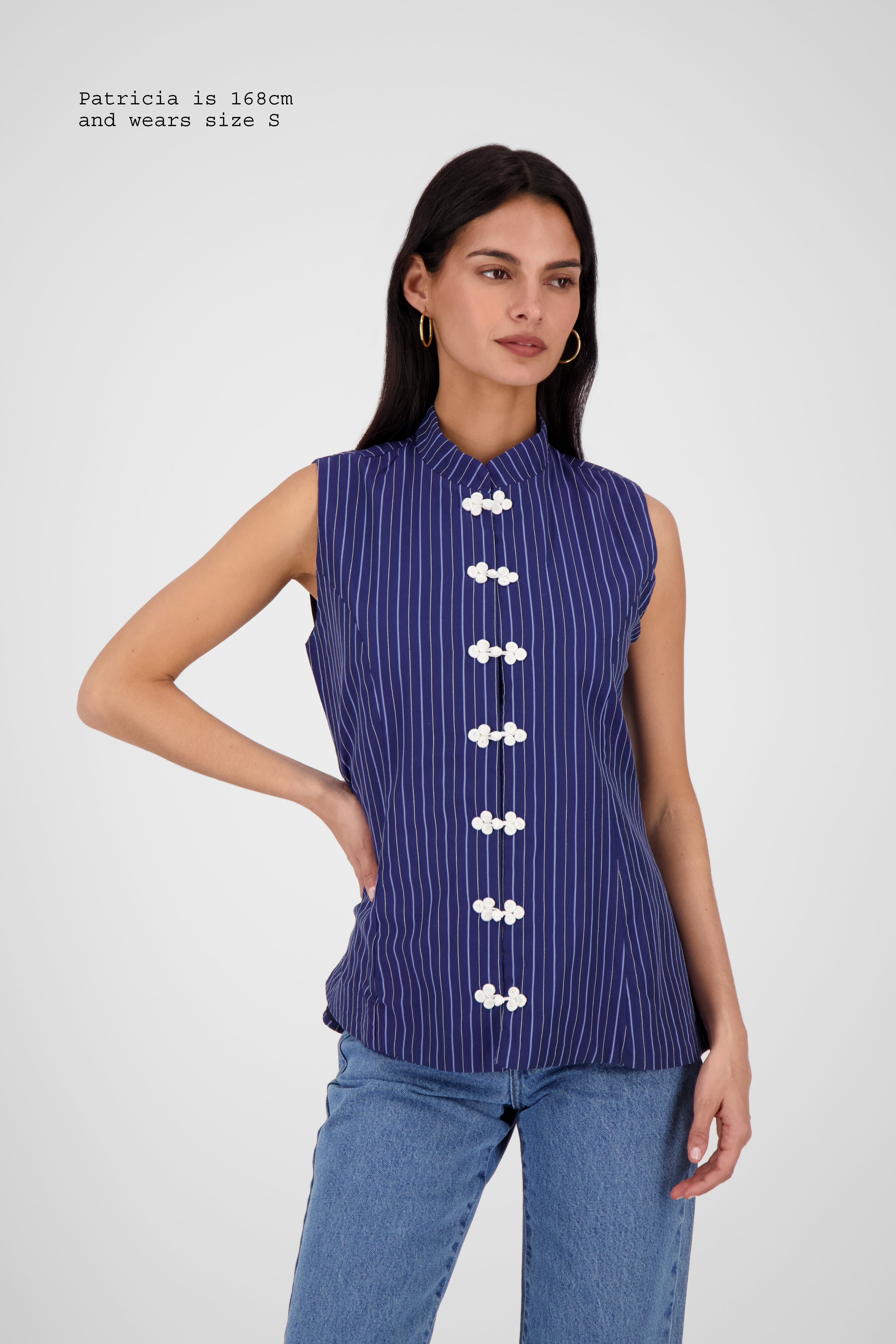 FITTED VEST WITH FASTENINGS