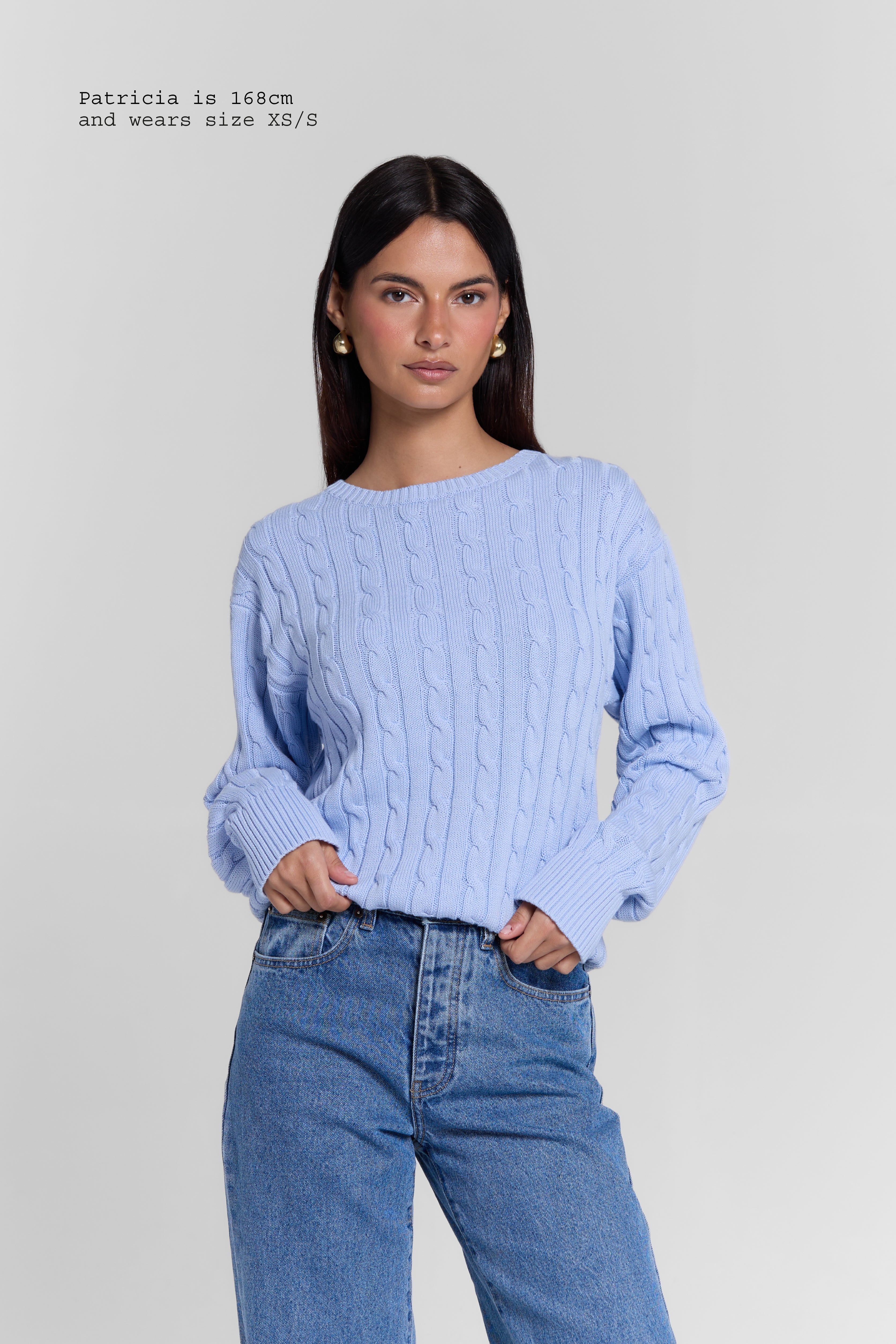 CABLE-KNIT SWEATER