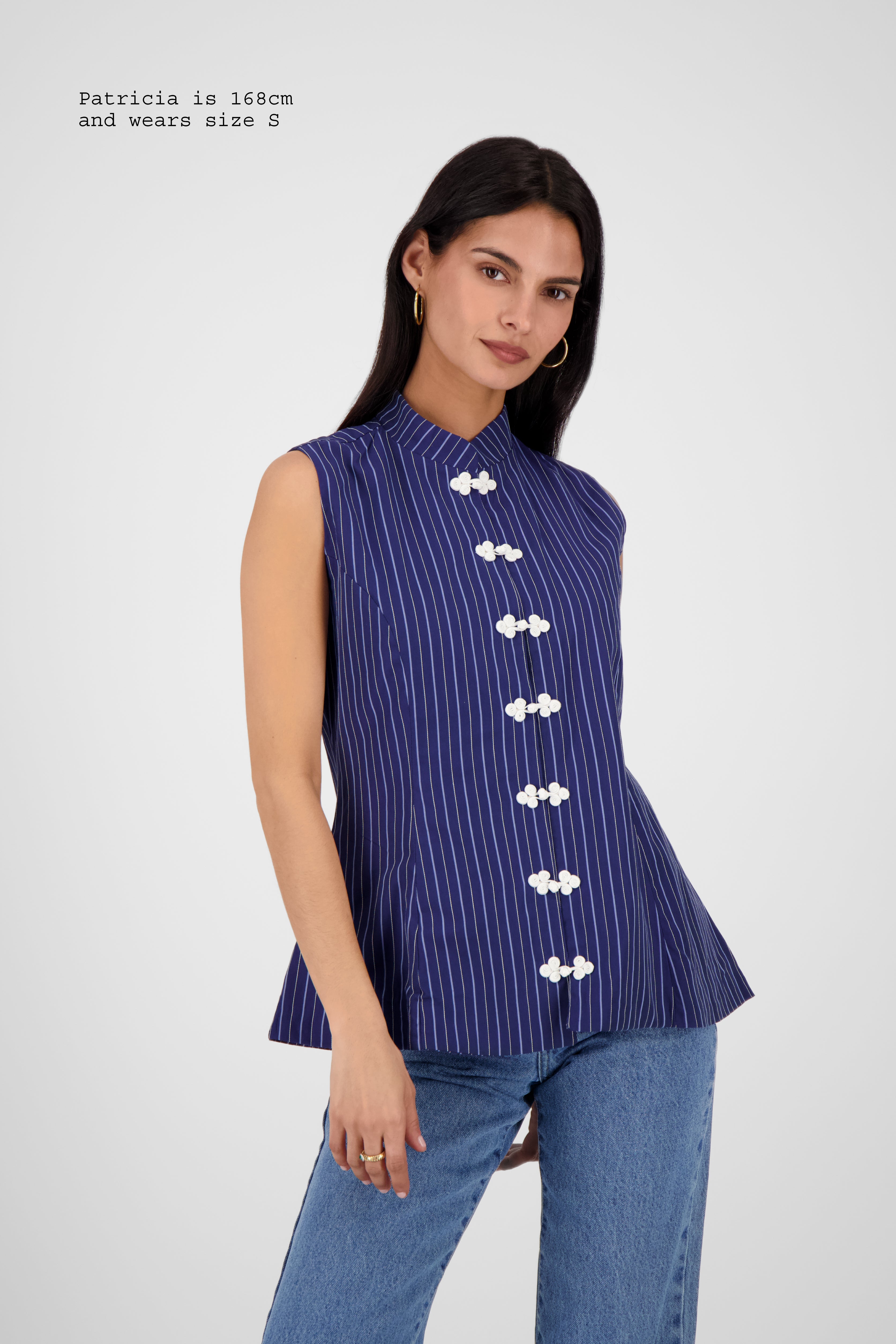 FITTED VEST WITH FASTENINGS