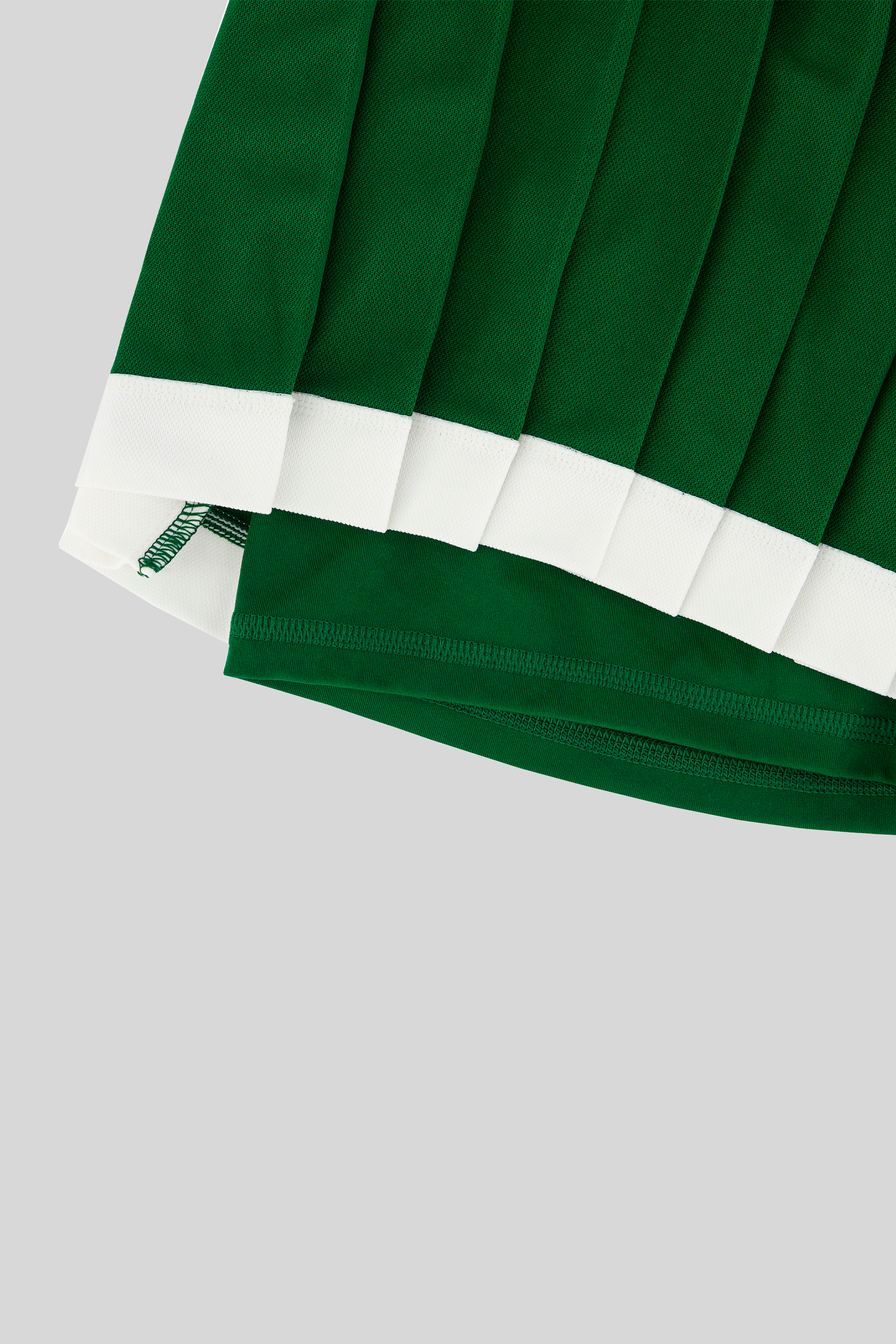 LACOSTE X LAMAREL PLEATED SKIRT